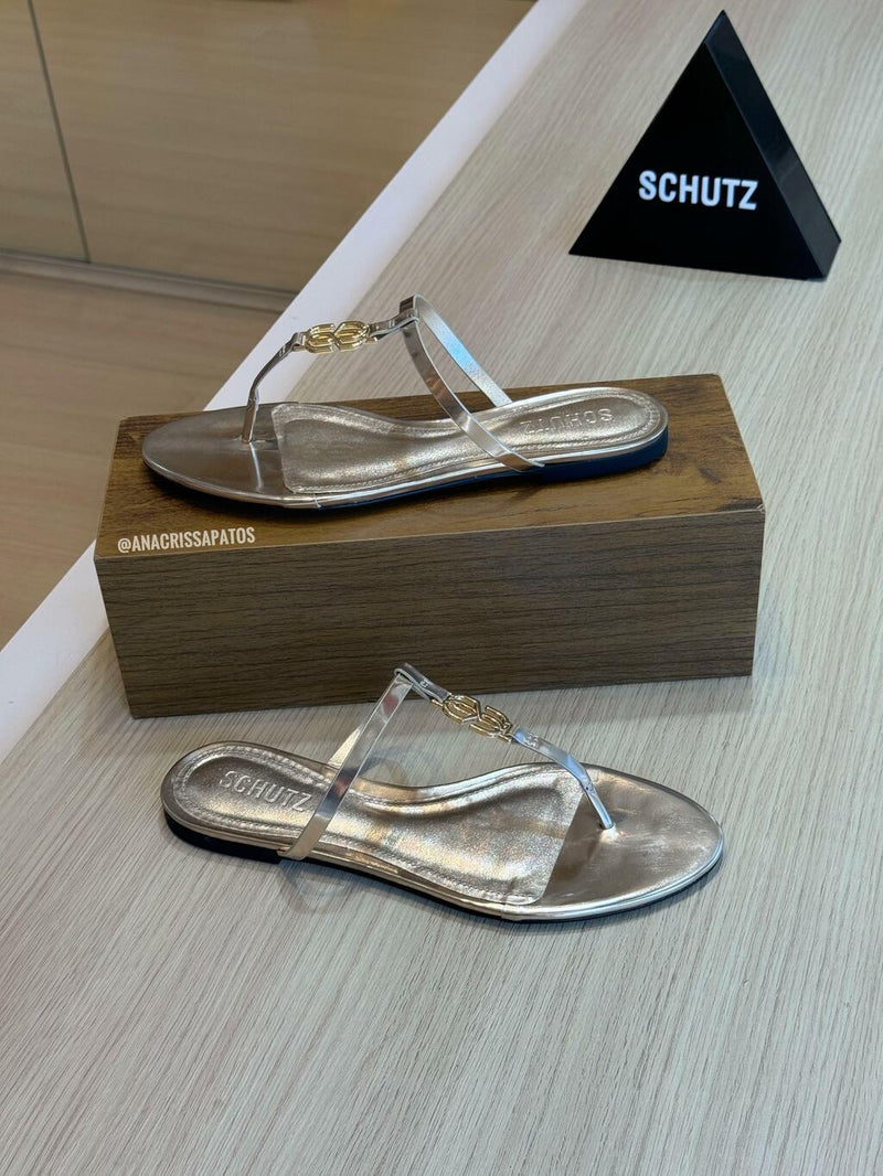 Schutz Flat Dourada Logo SS Metal Rasteira S22112 0002 0002U